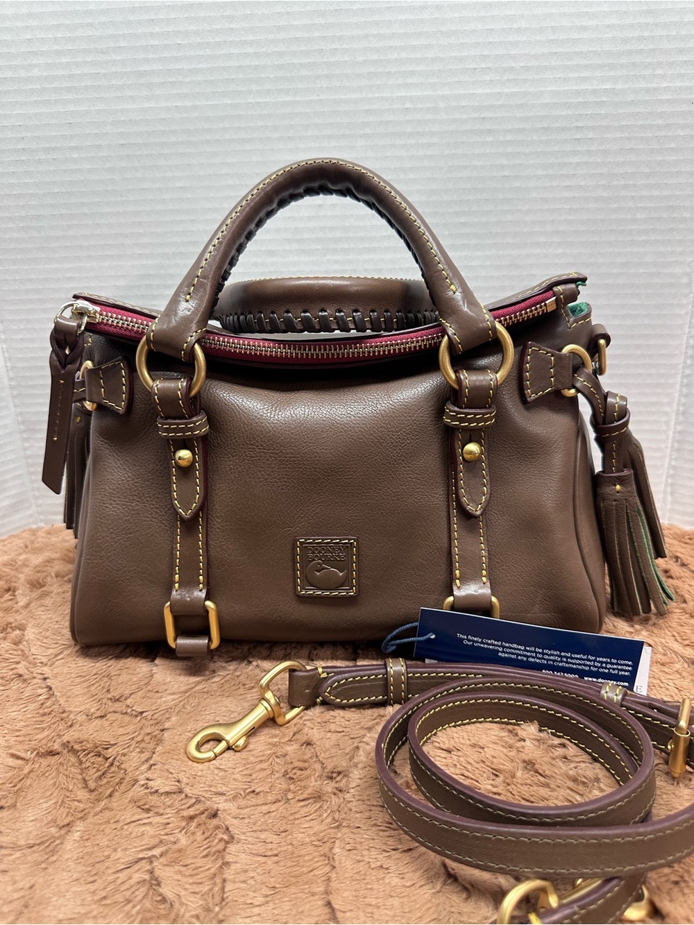 Dooney and Bourke Leather Satchel Bag with Tassel Accent